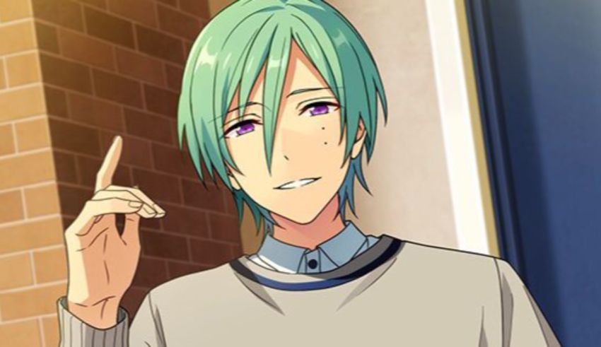 A man with green hair is pointing at something.