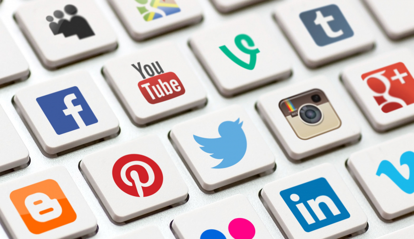 Social media icons on a keyboard.