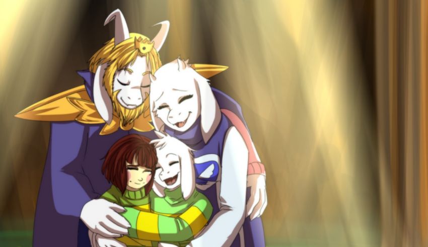 A group of people hugging in front of a light.