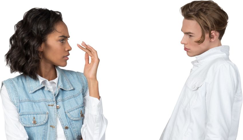 A man and woman talking to each other on a white background.