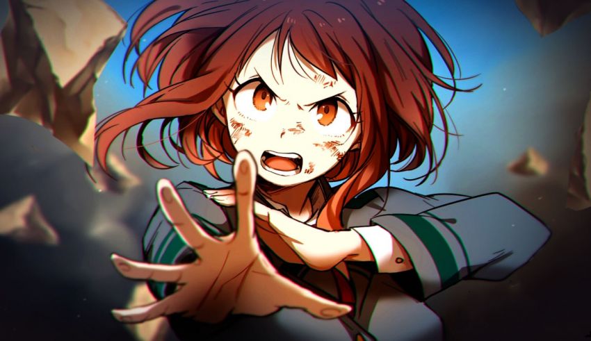 A girl with red hair is holding her hand out in front of a rock.