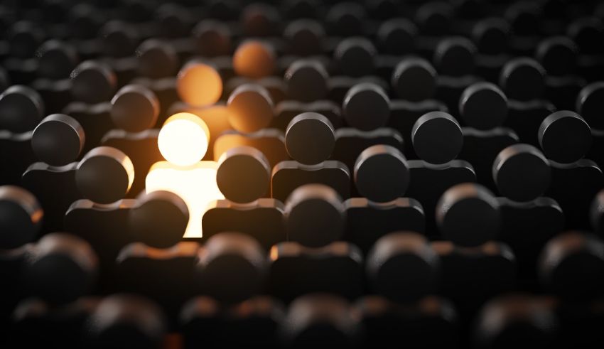 A person standing out in a crowd of people.