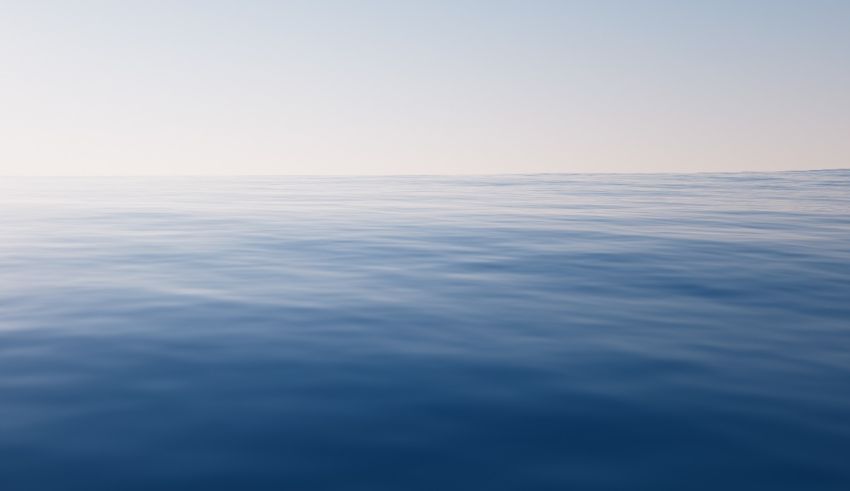 An image of a blue ocean with a cloudy sky.