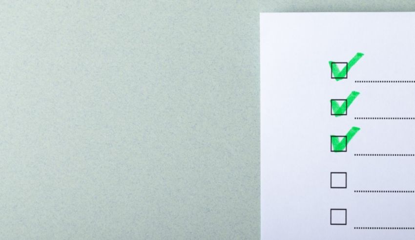 A paper with a green check mark on it.