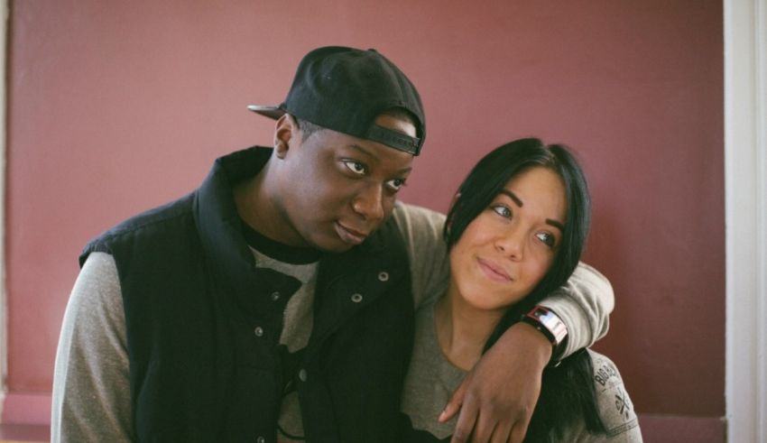 A man and woman posing for a photo.