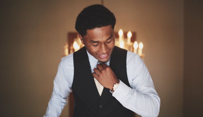 A man in a vest and tie.