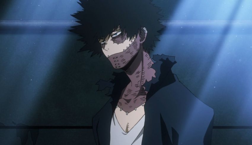 An anime character with black hair standing in a dark room.