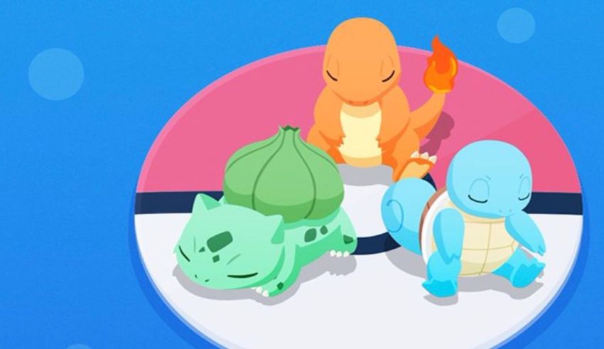 A group of pokemon sitting on top of a ball.