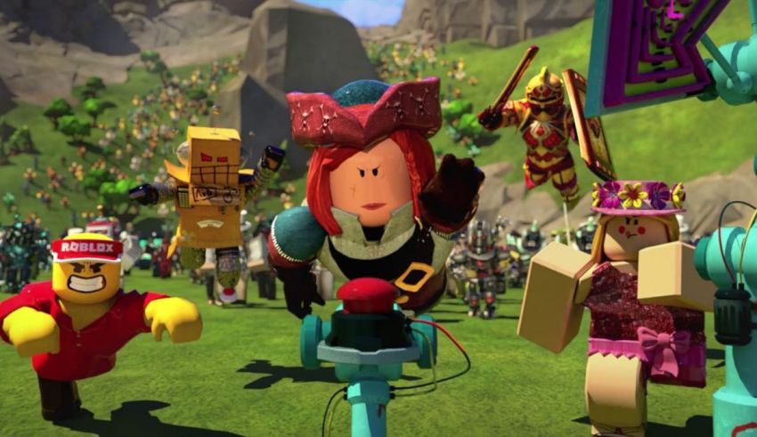 A group of lego characters in a grassy field.