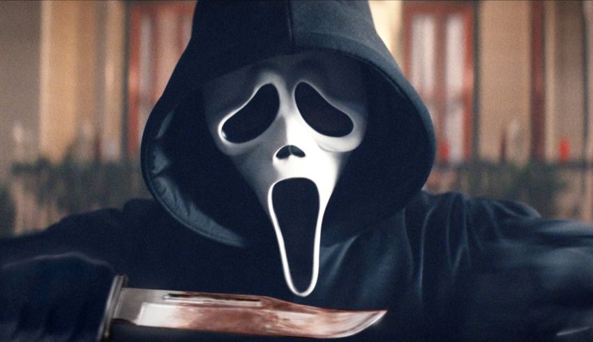 A man with a scream mask holding a knife.