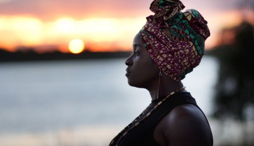 A woman wearing a head wrap.