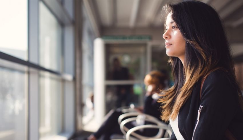 A woman sitting in a chair.