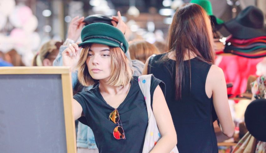 A woman wearing a green hat.