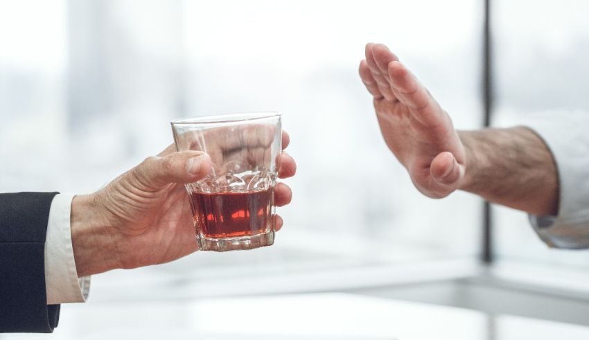 A man is giving another man a high five.