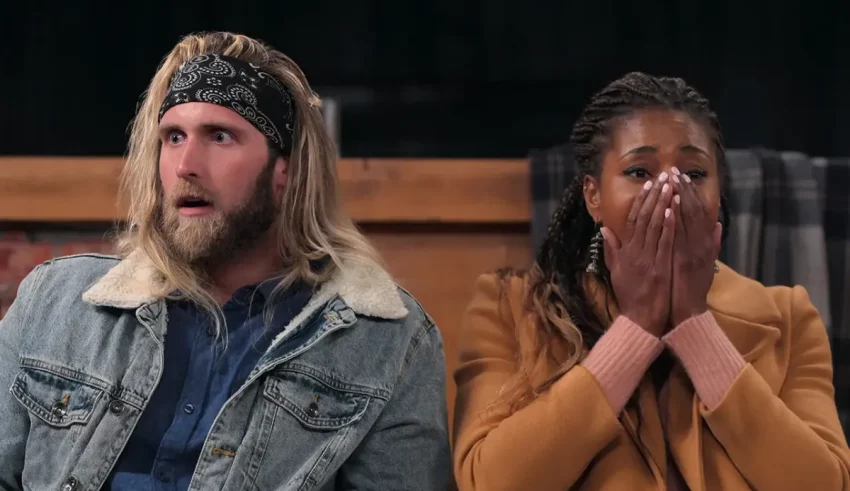 A man and a woman sitting next to each other.