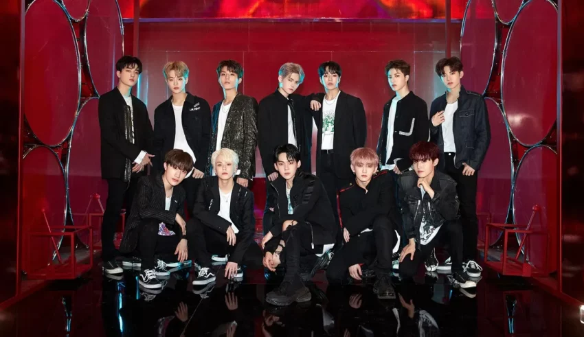 A group of korean boys posing for a photo.